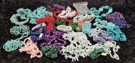 Large quantity of necklace and bracelets mostly from semi precious material coral and quarts
