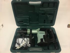 Hitachi demolition 240 volt hammer drill in case with instructions.