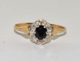 9ct gold ladies Diamond and Sapphire cluster ring size O