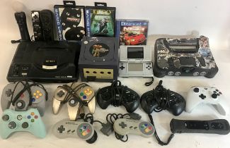 Big collection of various gaming devices from makes - Nintendo - Wii - Sega - XBox etc.