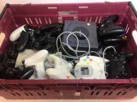 Crate of various gaming consoles and controllers to include makes - Wii - Nintendo and Sega etc.