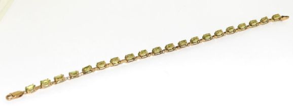 9ct gold and natural peridot line bracelet 7".
