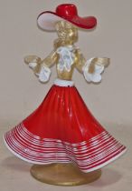 A vintage Murano figurine of a flamenco dancer in a red dress and hat 19cm tall. Please examine.