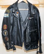 Lewis leather motorbike jacket and badges. 27" pit to pit. 16" pit to cuff, 26" base of collar to