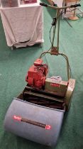 Hayter Ambassador 2 vintage petrol powered lawn mower with grass collecting box.