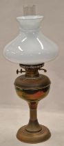 Oil lamp with a chimney and glass shade