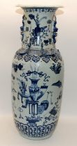 A large Chinese blue and white baluster vase decorated with an array of auspicious objects with