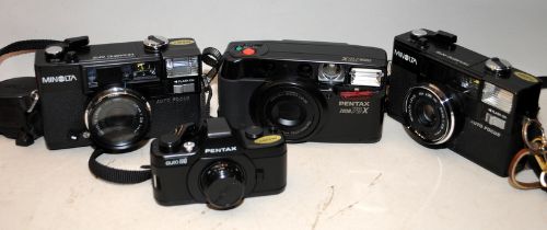 Collection of vintage cameras top include 2 x Minolta Hi-Matic AF2 35mm compact cameras, Pentax