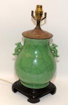 Oriental crackled glaze emerald green lamp with dragon handles, H39cm including fitting.