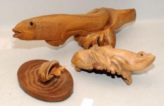 2 x Oriental creatures carved from driftwood, a fish and a toad c/w a carved fish signed Rodney