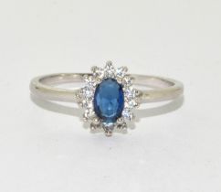 A 925 silver and blue sapphire cluster ring Size Q