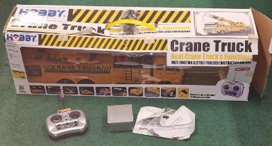 Hobby Engine boxed Radio Controlled Crane Truck with controllers, charger and instructions.