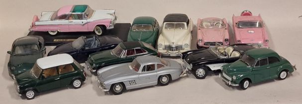 Group of unboxed Burago and other large die cast car models to include classic cars (12).