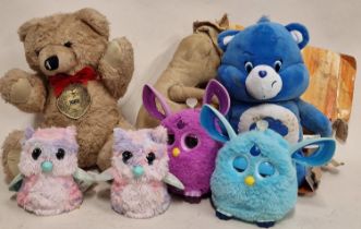 Mixed soft toys to include Furby's, Care Bear and a vintage Merrythought teddy.