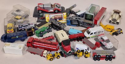 Box of miscellaneous boxed and unboxed die cast vehicles.