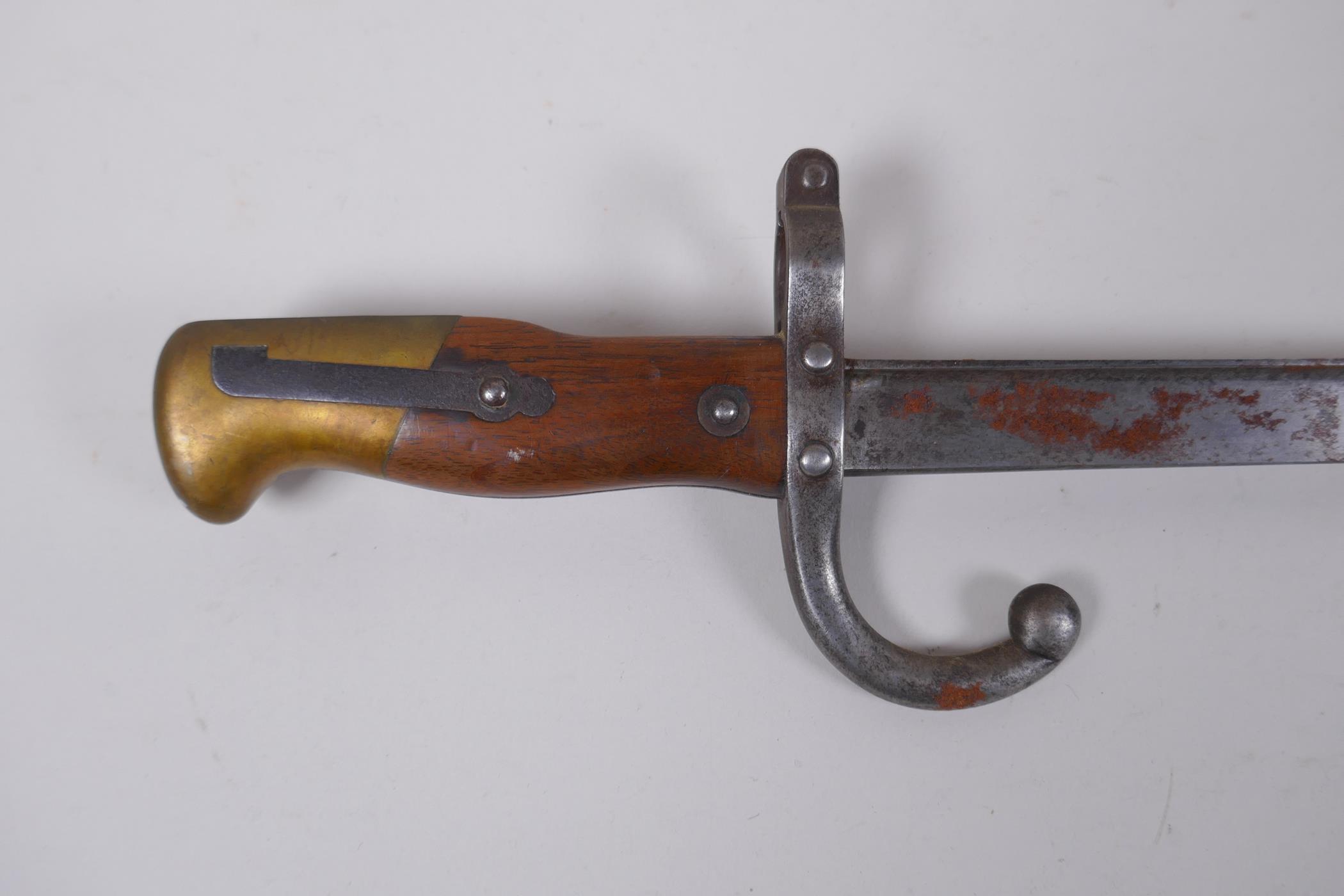 A late C19th French model 1878 bayonet, manufactured in Steyr, Austria, by The Austrian Arms - Image 2 of 6