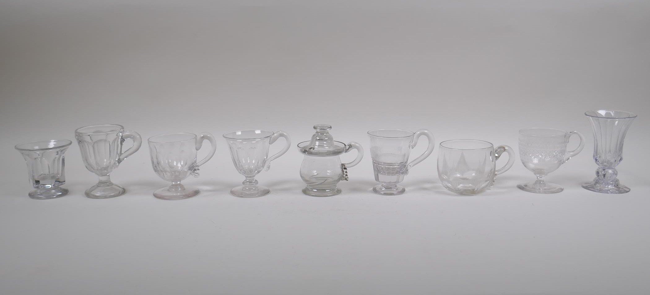 A collection of eight C19th and C20th jelly/custard glasses with slice and etched glass