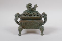 A Chinese bronze censer and pierced cover with two handles and kylin knop, 6 character mark to base,