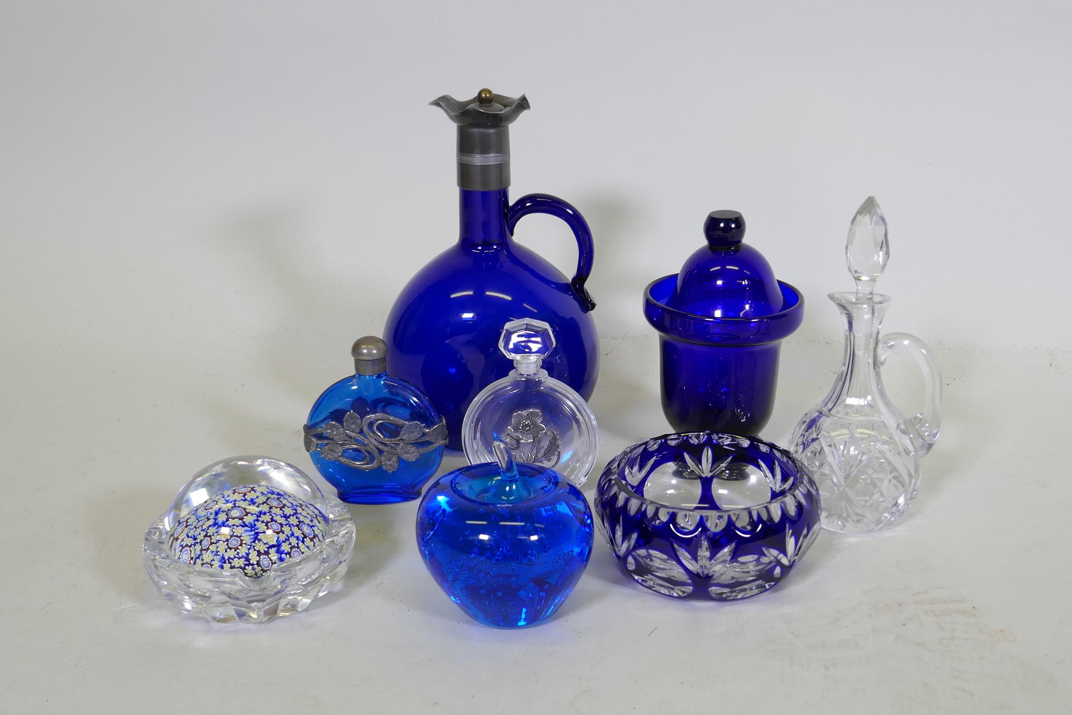 A glass millefiori paperweight, a St Louis glass ashtray, a Victorian oil jar, two scent bottles,