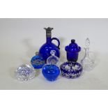 A glass millefiori paperweight, a St Louis glass ashtray, a Victorian oil jar, two scent bottles,