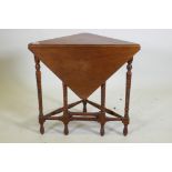 A Victorian walnut corner occasional table with drop leaf, 69 x 37 x 65cm