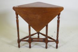 A Victorian walnut corner occasional table with drop leaf, 69 x 37 x 65cm