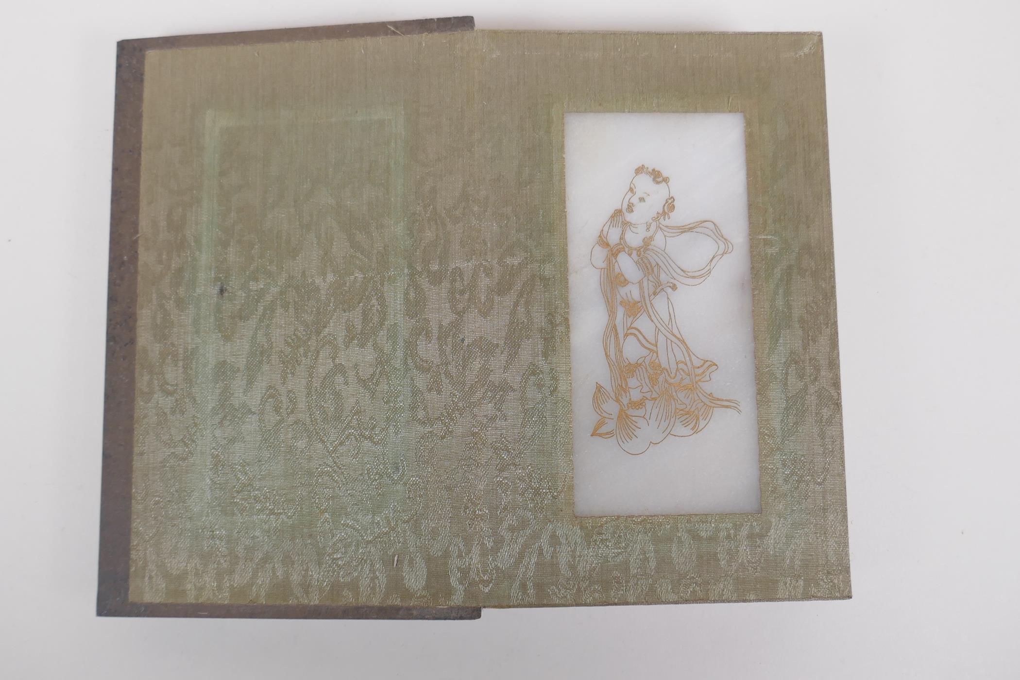 A Chinese wood and silk bound book containing white jade tablets with chased and gilt character - Image 7 of 8