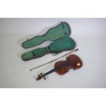 An antique violin, bears label Giovanni Paolo Grancinero 'Special Orchestra Violin' fabricante