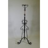 A Victorian wrought iron telescopic floor lamp stand, 138cm high, 200cm extended