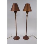 A pair of brass table lamps with shades, 50cm high