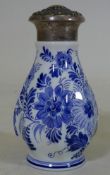 A Delft Pottery sugar sifter with white metal top, marked 830, with export mark and date letter P.