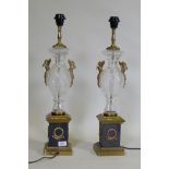 A pair of glass and brass table lamps, with Empire style decoration, 64cm high