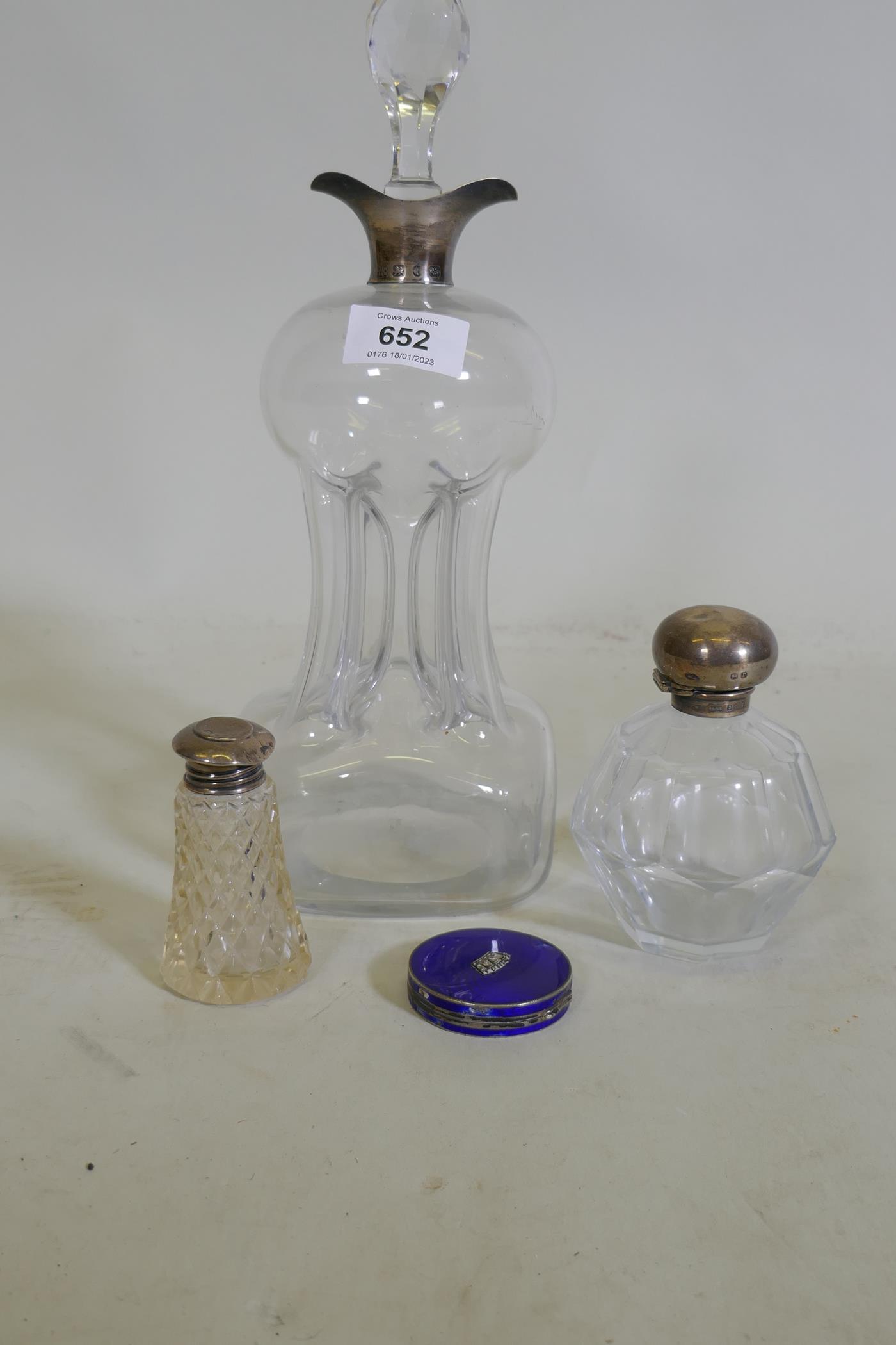 A Victorian glass decanter of waisted form with silver mount, Hukin & Heath, Birmingham 1883,