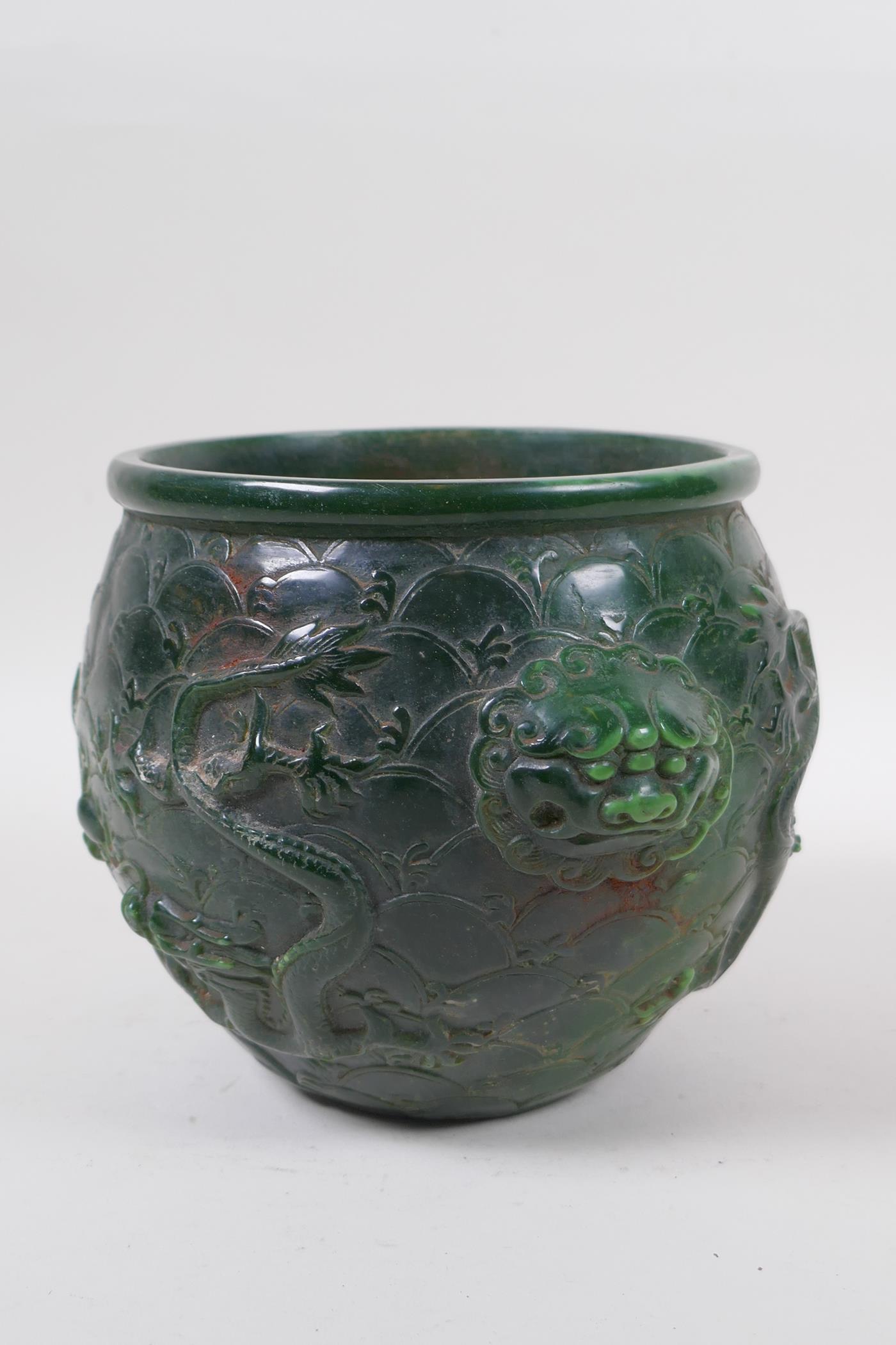 A Chinese reconstituted green hardstone jar with two lion mask handles and raised dragon decoration - Image 2 of 5