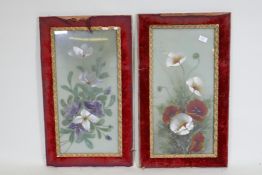 A pair of Victorian floral paintings on glass in velvet frames, 43 x 74cm