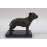 A filled bronze figure of a Staffordshire Bull Terrier, on a marble base, 17cm long