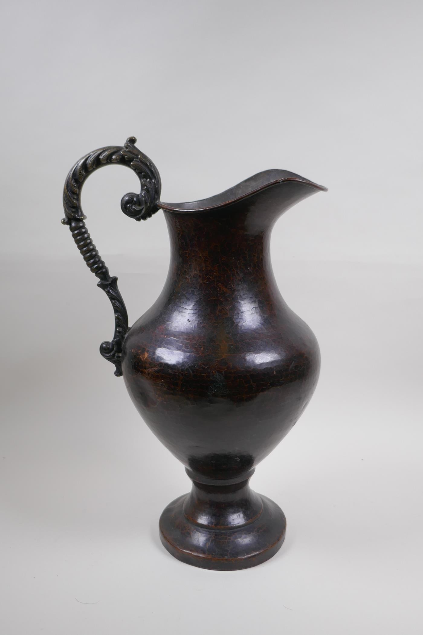 A patinated hammered copper urn with bronze handle, 39cm high - Image 4 of 6