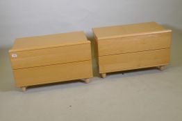 A pair of Hulsta contemporary beechwood veneered bed side chests, with two soft close drawers,