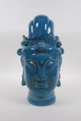A Chinese teal crackle glazed porcelain head bust of Quan Yin, character inscription to base, 32cm
