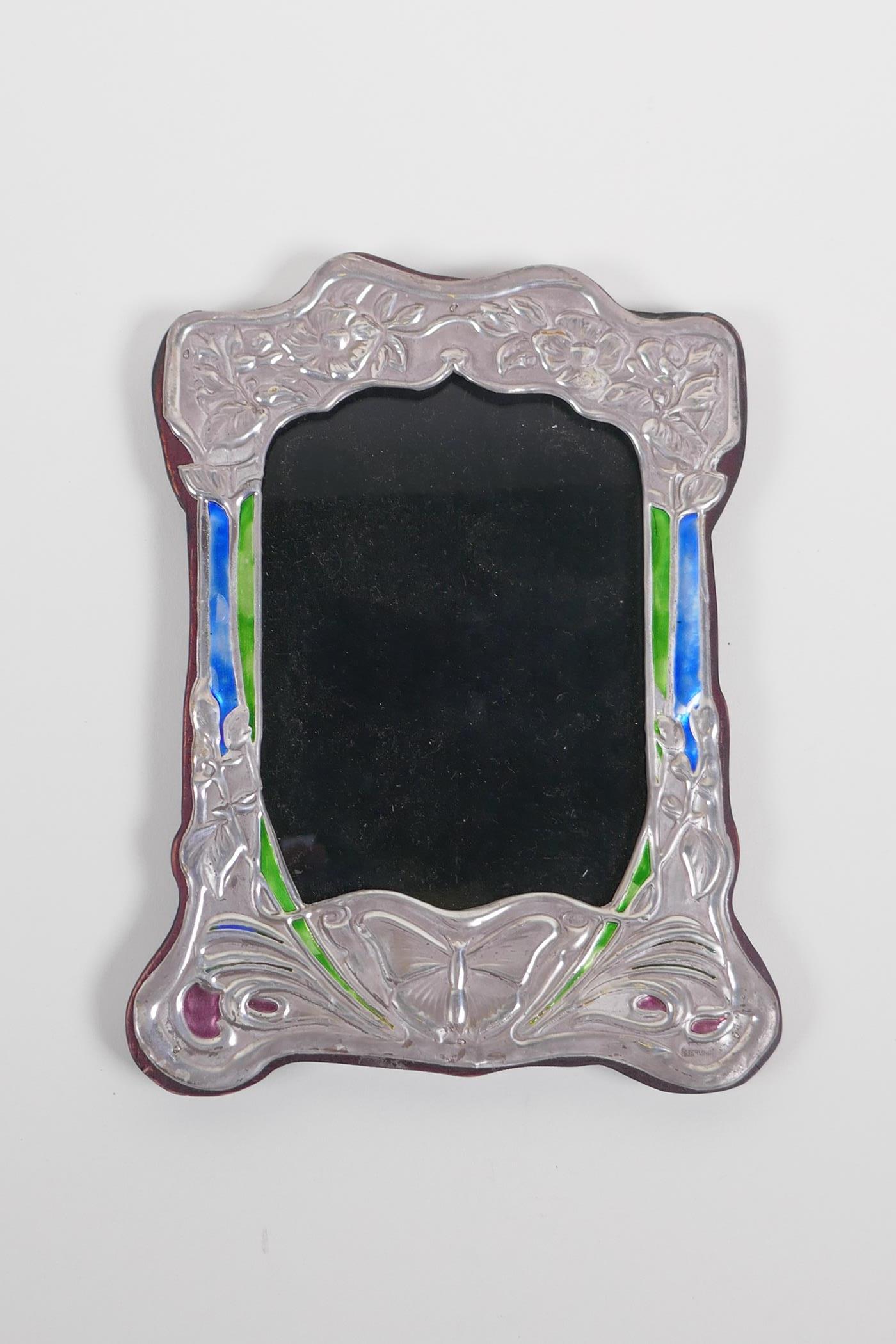 A sterling silver and enamelled Art Nouveau style photo frame, 15cm x 20cm