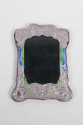 A sterling silver and enamelled Art Nouveau style photo frame, 15cm x 20cm