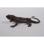 A Japanese bronze okimono lizard, mark to base, 13cm long