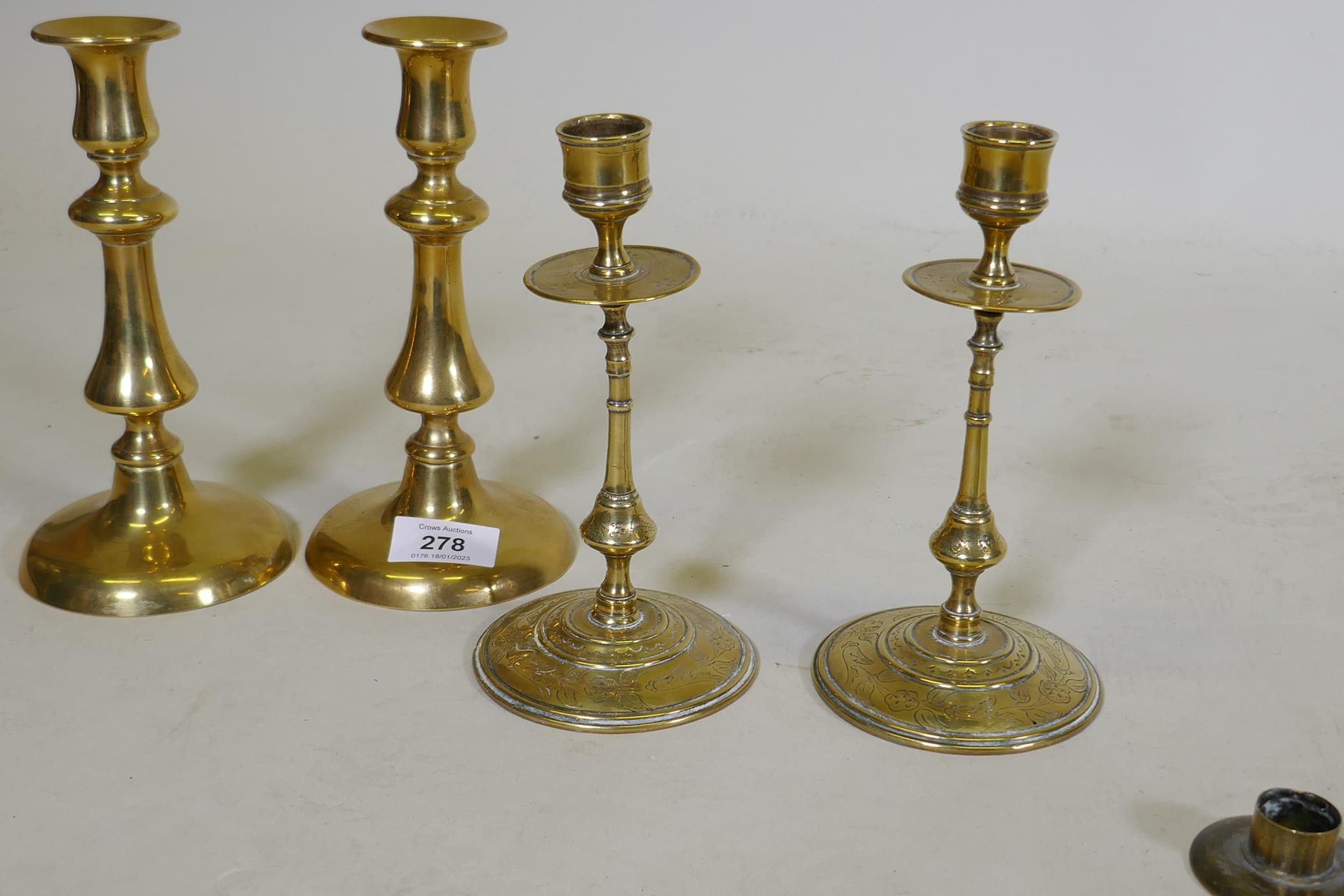 A pair of C18th/C19th  brass candlesticks, possible French/Flemish, with engraved decoration, - Image 4 of 5