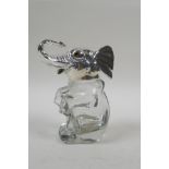 A silver plated and glass ink well in the form of an elephant, 14cm high