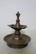 An antique brass stupa/censer, 23cm high