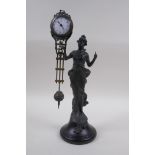 An Art Nouveau style figural bronze mystery clock, 29cm high