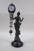 An Art Nouveau style figural bronze mystery clock, 29cm high