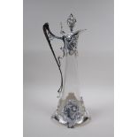 An Art Nouveau style silver plate and glass claret jug, 41cm high