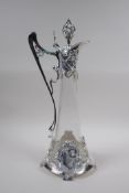 An Art Nouveau style silver plate and glass claret jug, 41cm high