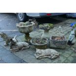 A quantity of reconstituted stone composition and concrete garden figures, planters and bird bath,